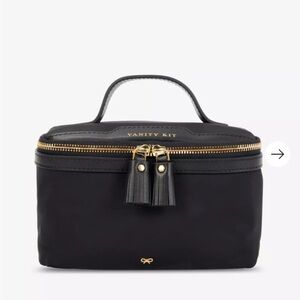 Anya Hindmarch travel bag  with Gold Accents